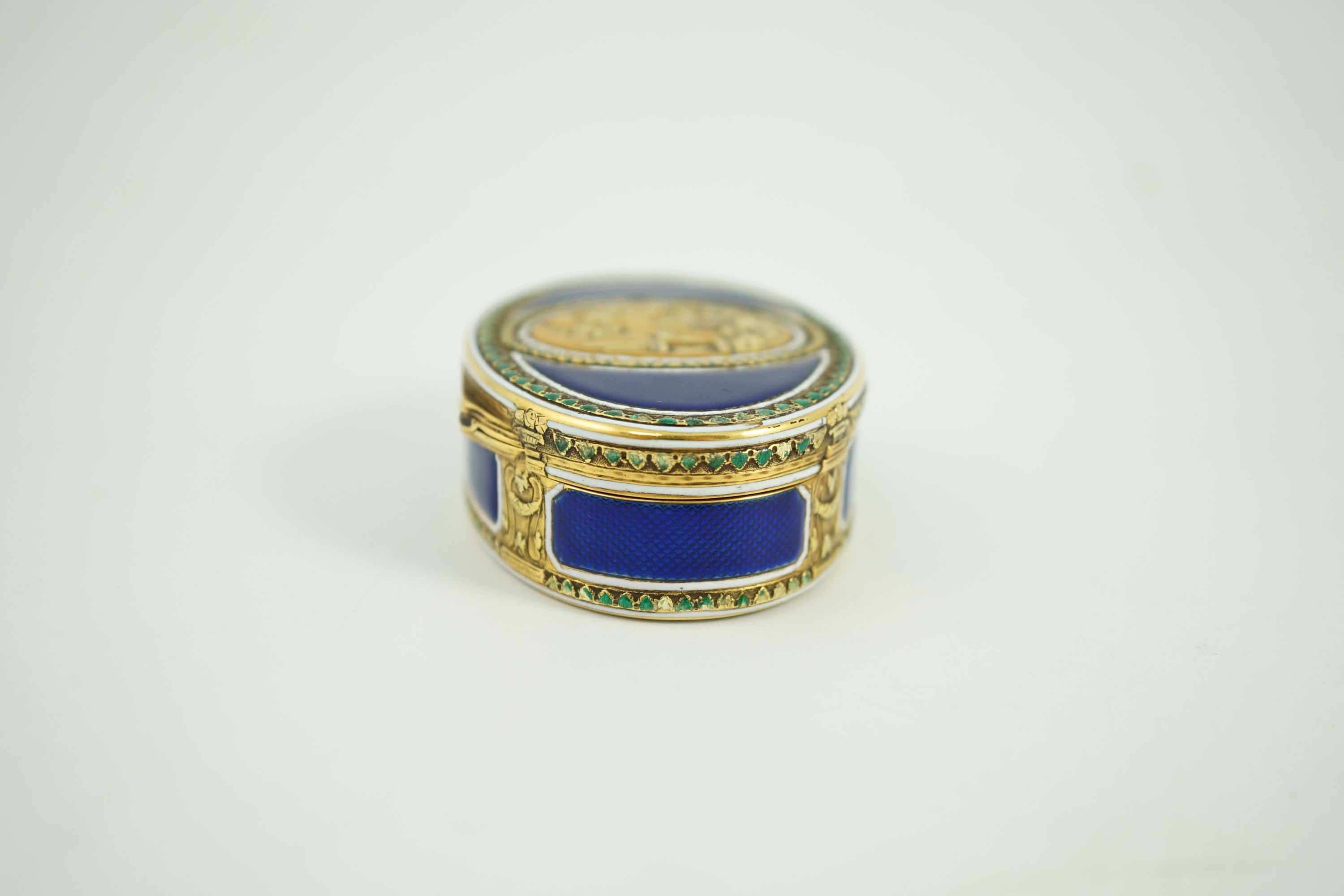A late 18th/early 19th century French? gold and polychrome enamel oval snuff box